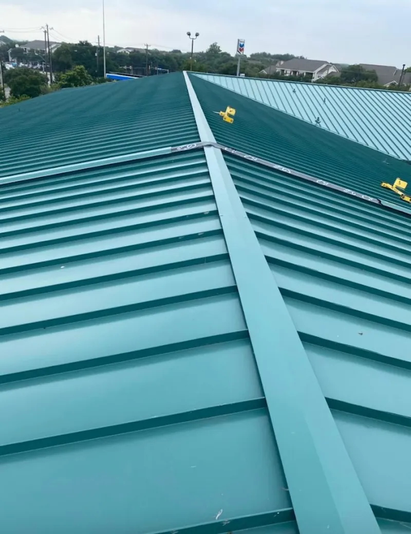 Green commercial metal roof ridge and valley for Metal Roof Repair in Hernando